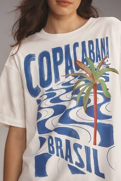 100% organic cotton Pullover styling Machine wash Imported | Copacabana Relaxed Graphic T-Shirt by Farm Rio in Beige, Women's, Size: Large, Cotton at Anthropologie Farm Rio Prints, Cool Shirt Designs Graphic Tees, Zara Tshirts, Festival Tshirt, Beach Cleanup, Hawaiian T Shirt, Shirt Design Inspiration, Graphic Tee Design