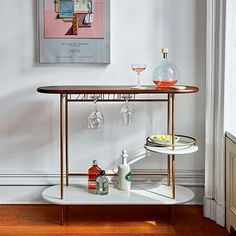 a bar cart with drinks on it in a room