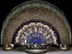 the stage is set up for a show with an elaborately designed peacock on it