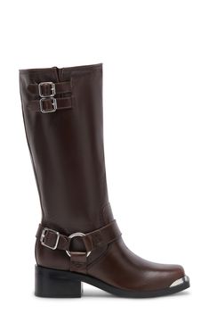 Give your look an on-trend update with this moto-style boot featuring a squared toe and matching block heel. A glossy O-ring harness, buckled straps and metal-tipped toe ensure a street-savvy edge. 2" heel 12" shaft; 15" calf circumference Pull-on style; adjustable two-buckle strap Leather upper/synthetic lining and sole Imported Moto Style, Leather Moto, Dark Brown Leather, Moto Boots, Nordstrom Rack, Block Heels, Dark Brown, Leather Straps, Brown Leather