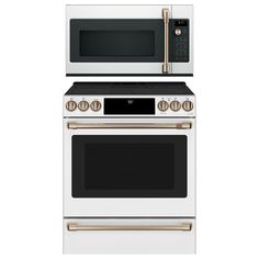 two ovens side by side with one open and the other closed, both white