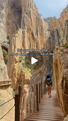 a person walking down a wooden walkway in the mountains with a quote above it that reads,'this road to the most dangerous hike in the west