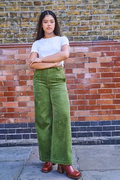 Delores Is Our High Waist Jeans With Wide Leg And Pockets With Stitching Detail. Available Here In Pesto Green! Our Fit Fixed Non-Stretch Waistband To Sit On The Waist With Fly Front And Button Closure Closer Fitting On The Hips Full Length Wide Leg Deep Hip Pockets And Back Patch Pockets The Fabric 100% Organic Cotton Corduroy - Made From Gots Certified Organic Cotton Yak Care Machine Washable We Advise Using A Laundry Bag To Protect The Cord Pile. It Will Also Prevent Creasing As Much Line Dry Green Cordoury Pants Outfit Women, Wide Corduroy Pants Outfit, Green Coudroy Pants Outfits, Green Wide Leg Pants, Wide Leg Corduroy Pants, Fall Midsize Fashion, Green Corduroy Pants, Green And Beige Outfit, Green Corduroy Pants Outfit