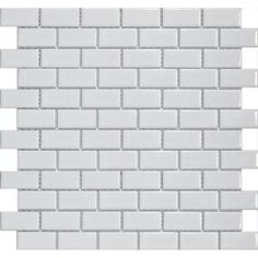 a white brick wall that looks like it has been made out of glass and is being used