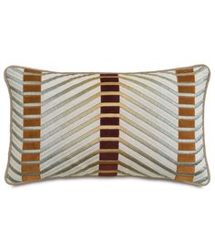 a rectangular pillow with brown and tan stripes on it, in front of a white background