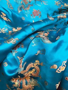 Hope TURQUOISE Dragon Brocade Chinese Satin Fabric by the Yard | Etsy Turquoise Dragon, Tropical Fabric, Polycotton Fabric, Cotton Poplin Fabric, Dragon Print, Faux Fur Fabric, Silk Brocade, Fur Fabrics