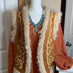 Size L Tan Vest With Off White Embroidery And Faux Fur Trim 100% Polyester, Super Soft! P2p 21" Length 20" *This Item Is Also Available With A Complete Bundle In Separate Listing!!!! Western/Boho Authentic Vintage Cowgirl Nostalgic American West Posh Live Hostess & Mentor @Trixieleec1 (Trixie) New To Poshmark? Use Code Trixieleec1 To Get $10 After Your First Purchase! Tan Vest, Vintage Cowgirl, Western Boho, White Embroidery, Fur Trim, Faux Fur, Off White, Jackets & Coats, Fashion Trends