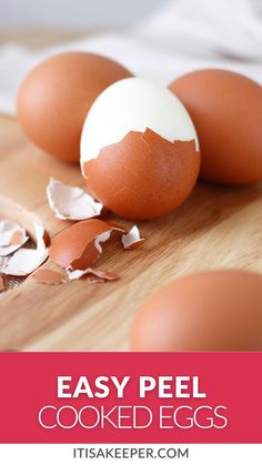 three eggs on a cutting board with the words easy peel cooked eggs