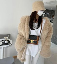 Chic Fluffy Fur Coat For Spring, Chic Fluffy Fur Coat, Fluffy Faux Fur Outerwear For Spring, Spring Faux Fur Coat With Faux Fur Trim, Chic Faux Fur Winter Outerwear, Chic Faux Fur Outerwear For Winter, Trendy Fluffy Fur Coat For Spring, Trendy Fluffy Spring Fur Coat, Chic Faux Fur Winter Coat