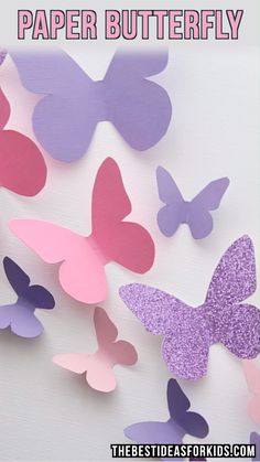 some paper butterflies are hanging on the wall with text overlay that reads, how to make paper butterfly garlands