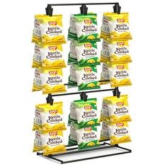 a display rack with several bags of coffee and cookies on it's sides, in front of a white background