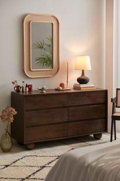 a bedroom scene with focus on the dresser