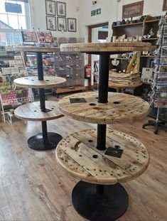 three tiered wooden table in a store