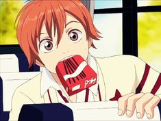 an anime character with red hair sticking out his tongue