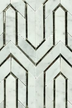 an image of marble tiles that look like hexagons or chevrons