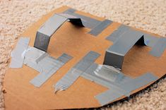 a piece of cardboard that has been cut into shapes