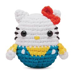 a hello kitty crochet basket is shown in white, blue, and yellow