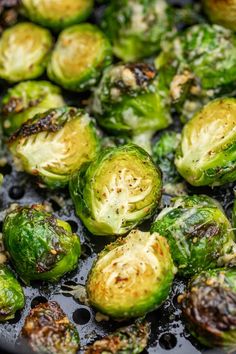 brussel sprouts are cooking in a skillet