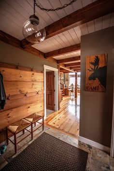 a room with wood paneling on the walls