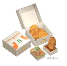 an open mcdonald's box filled with chips