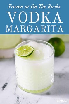 a drink in a glass with a lime slice on the rim and text overlay reads frozen or on the rocks vodka margarita