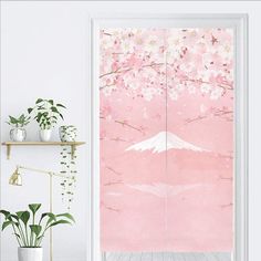 an open door with pink and white wallpaper in the background, next to a potted plant