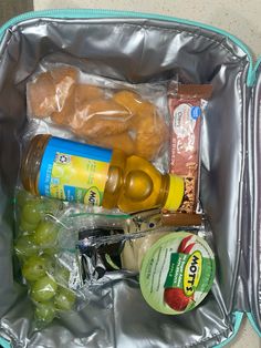 an open lunch bag filled with food and drinks