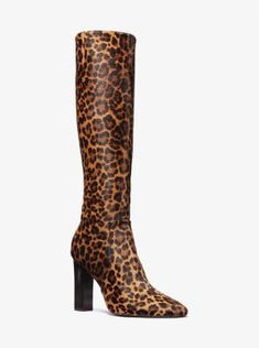 Statement boots dominated the Fall/Winter 2023 runway, and the Carly was undisputedly one of the most noteworthy offerings. Crafted from leopard-print calf hair, this towering pair features a sleek pointed toe and stands on a stacked block heel for elegant height. A subtle side zip fastening makes for ease of wear while keeping the silhouette streamlined. Black Leopard Boots, Animal Print Boots Outfit, Print Boots Outfit, Winter 2023 Runway, Leopard Costume, Statement Boots, Animal Print Boots, Leopard Print Boots, Leopard Boots