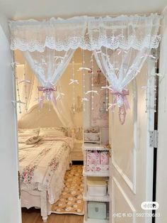 an open door leading to a small bedroom