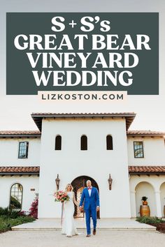 a man and woman standing in front of a building with the words s's great bear vineyard wedding