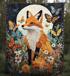 a quilt with an image of a fox and butterflies on it, in the woods