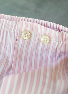 The styling of our woven Perfect Boxer in Light Pink Stripes has been meticulously honed to provide the perfect rise and fit. The fit does away with all excess, baggy fabric and is as comfortable when worn under a pair of slim 5-pocket jeans as under dress pants. Our boxer features bespoke details found only in exclusive custom-made boxers. There are two operable buttons at the waist, as well as a functional fly opening. The waistband elastic is fully covered with pleated fabric running the length of the waist, further enhancing comfort by eliminating skin contact with elastic. Crafted from our super soft Light Pink Stripes cotton shirting fabric. Please note that for hygienic reasons, we cannot accept returns on underwear, unless due to defects in quality or workmanship.• Modern Fit• 100% Under Wears Men, Anchor Threads, Shirting Fabric, Simple Fits, Closet Makeover, Fall Wear, Custom Buttons, Mens Boxers, Brand Development