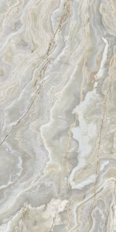 an image of marble that looks like it has been painted white and grey with gold accents