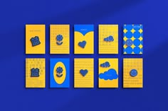 six pieces of blue and yellow paper with different designs on them