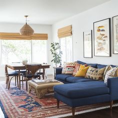 a living room filled with furniture and decor