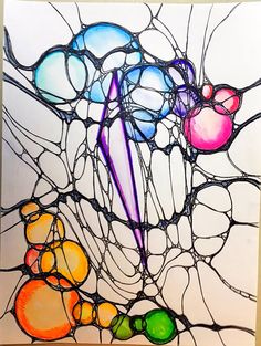 a painting with many different colors and shapes on the glass, as well as an abstract design