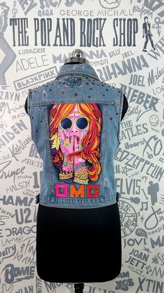 Beautifully handpainted denim jacket with a psychedelic girl portrait at back,the jacket is also embellished with colorful metal and stone studs.Check it out on our etsy shop. Casual Hand Painted Cotton Denim Jacket, Artistic Hand Painted Blue Denim Jacket, Hand Painted Long Sleeve Denim Outerwear, Multicolor Graphic Print Denim Jacket, Hand-painted Fitted Cotton Denim Jacket, Studded Denim Jacket, Studded Denim