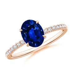 an oval blue sapphire and diamond ring