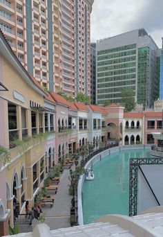 an empty swimming pool in the middle of a city