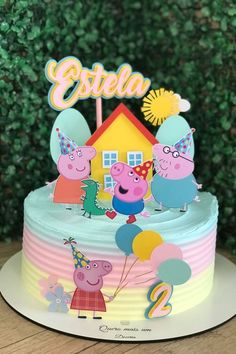 peppa pig birthday cake with name and age on it, sitting on a table