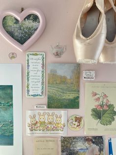 there are many cards and pictures on the wall with ballet shoes hanging from it's hooks