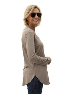 Take a look at our Cocoa V Neck Long Sleeve Top Made out of soft rayon modal and lycra Fabric content: 95% rayon modal, 5% spandex Long Body with sides slightly shorter than front and back V Neck with 1/2" band Long sleeves Back length from top to bottom 28" Fall 4-way Stretch Tops, Stretch Rayon V-neck Top, Summer Long Sleeve Top For Layering, Stretch Long Sleeve Top For Summer Layering, Versatile Solid Color Stretch Long Sleeve Top, Versatile Rayon Tops For Layering, Versatile V-neck Top With 4-way Stretch, Versatile V-neck Tops With 4-way Stretch, Versatile Viscose Tops For Loungewear