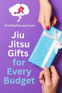 two hands holding a blue gift box with white polka dots and the words ju jitsu gifts for every budget