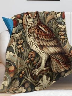 an owl sitting on top of a couch