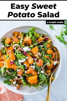 a white bowl filled with salad on top of a table