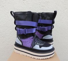 UGG POP PUNK HIGH TOP SNEAKER BOOTS ~ NEW IN BOX  ~ WOMEN'S SIZE 5/ EUR 36/ UK 3 ~ STYLE FITS TRUE TO SIZE  ~ COLOR: TRUE NAVY ( BLUE/ MULTI)  MY ITEMS ARE ALWAYS AUTHENTIC, PLEASE SEE MY TRUSTED FEEDBACK Lace-up closure lowers, Zip on the upper shaft  Suede, patent and mesh UGG logo on the glossy patent heel Functional straps on the shaft Mesh lining and insole Treadlite 2' sole Inside size tag and box upc have been marked to prevent retail store returns Please note, most UGG's are now made in China or Vietnam. NONE are made in Australia PLEASE READ: MY ITEMS ARE ALWAYS AUTHENTIC, THIS PAIR HAS THE HOLOGRAM ON THE LEFT BOOT SOLE I BUY ALL MY ITEMS FROM THE UGG PARENT COMPANY ( DECKERS).YES, DECKERS OWNS UGG AND IS LOCATED IN MY HOMETOWN! I HAVE SOLD OVER 20000 PAIR OF AUTHENTIC UGG'S, BUY Punk High-top Fitted Platform Boots, Edgy High-top Platform Boots With Zipper, Punk High-top Synthetic Platform Boots, Purple High-top Platform Boots, High-top Punk Platform Boots With Reinforced Heel, Sneaker Platform, Animal Print Crop Tops, Platform Boots Women, Patent Heels