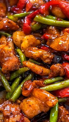 chicken and green beans with sauce in a skillet