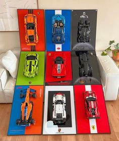 a group of toy cars sitting on top of a rug