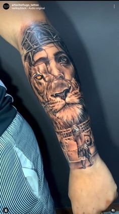 a man's arm with a tattoo on it that has a lion in the middle