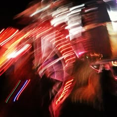 blurry photograph of street lights at night